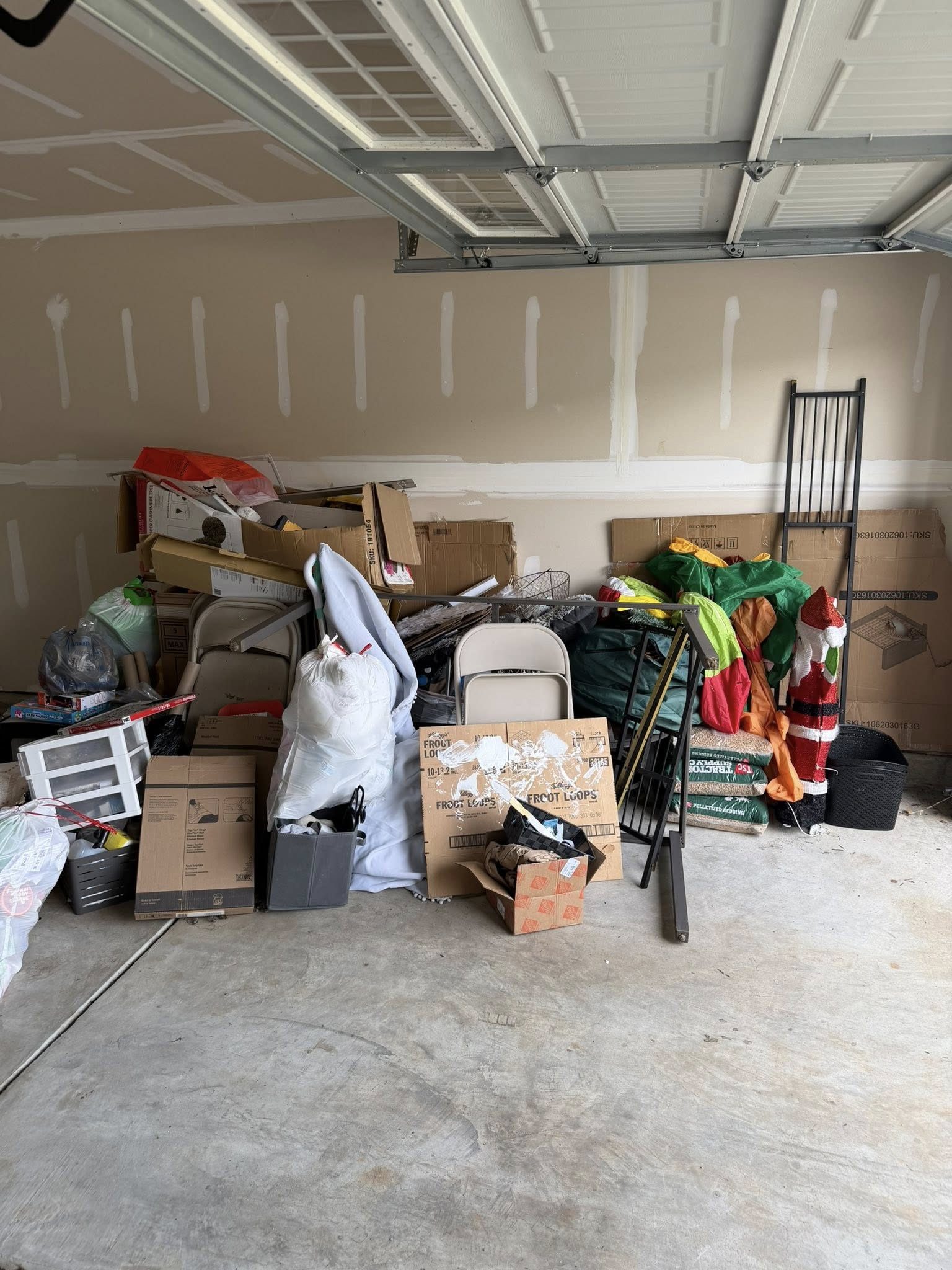 Garage Cleanout before junk removal by Coyles on Call